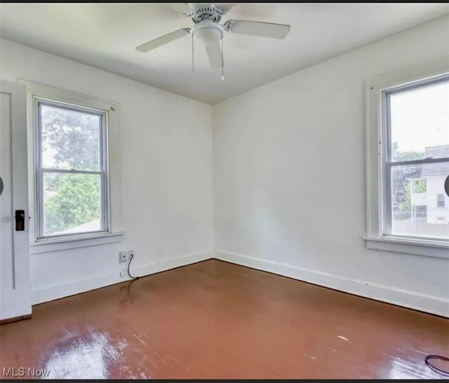 Empty room with baseboards