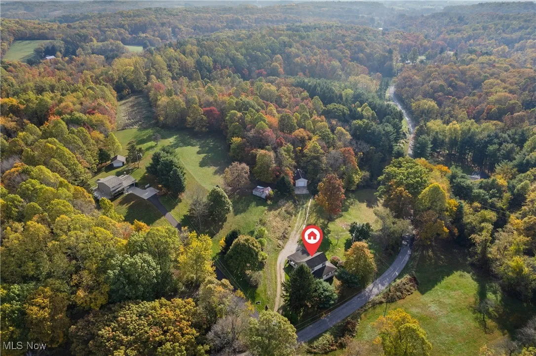 Drone / aerial view of a heavily wooded area