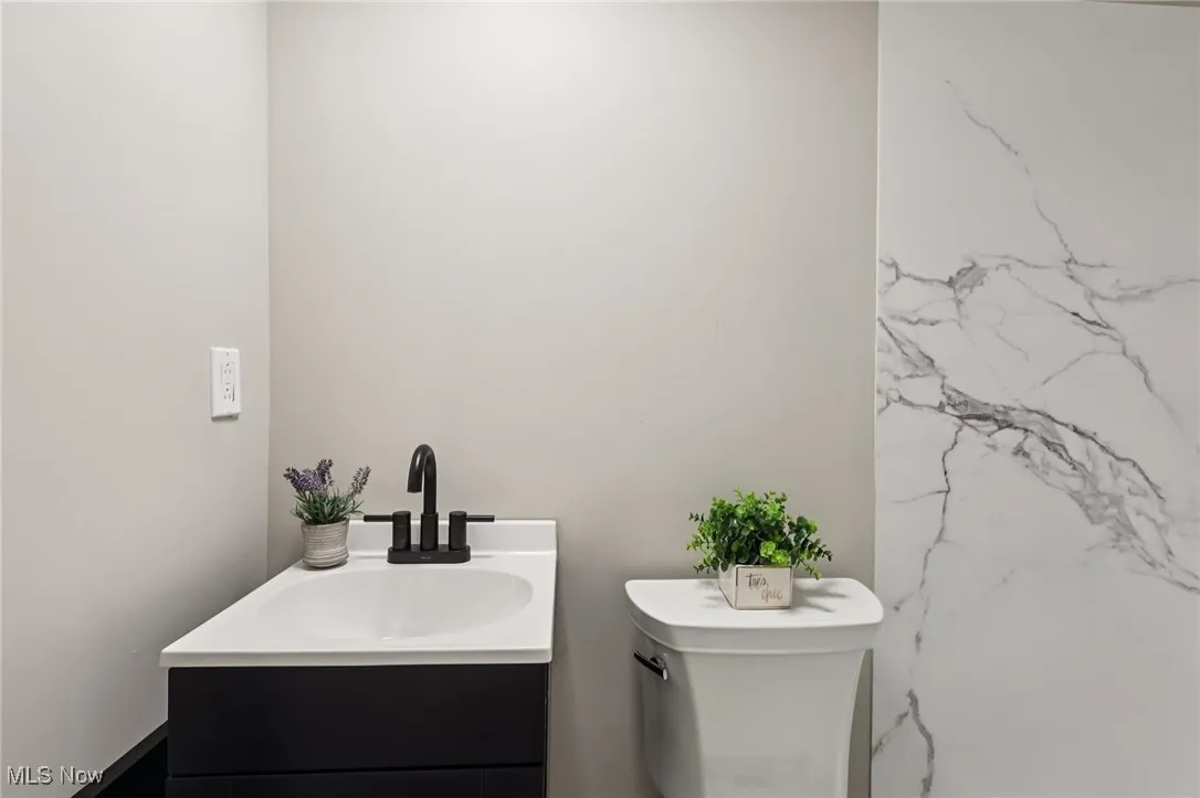 Bathroom with vanity and toilet