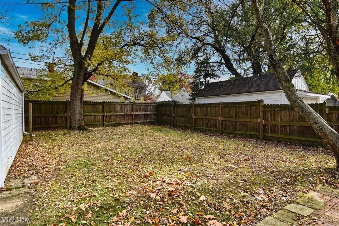 View of fenced backyard