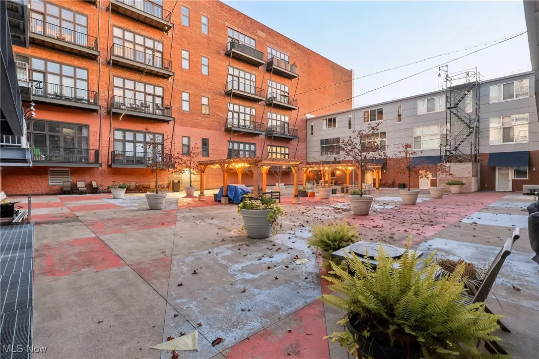 View of property's community featuring a patio