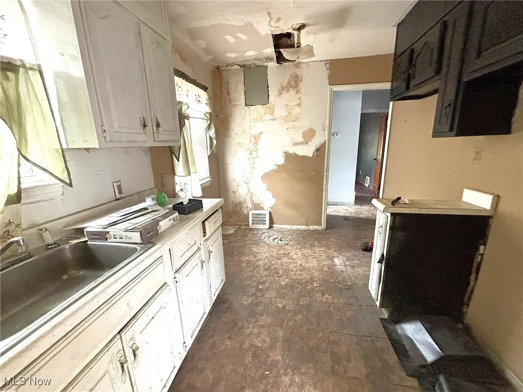 Kitchen with light countertops