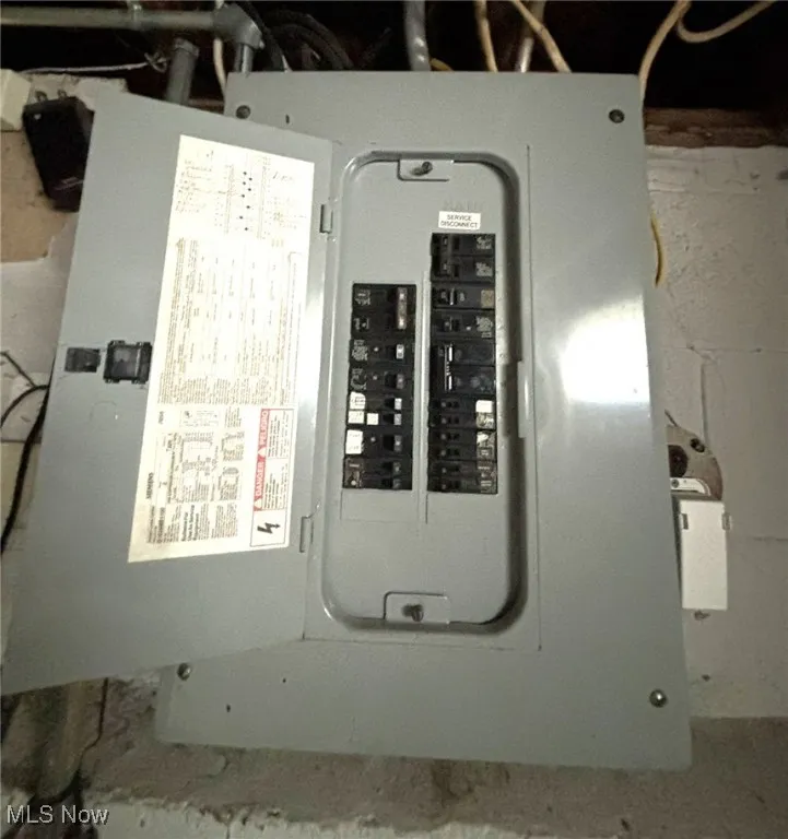 Utility room featuring electric panel