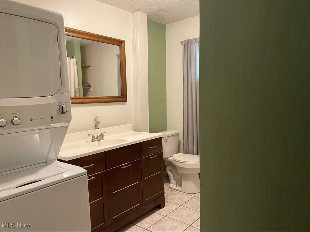 Bathroom with washer and dryer.