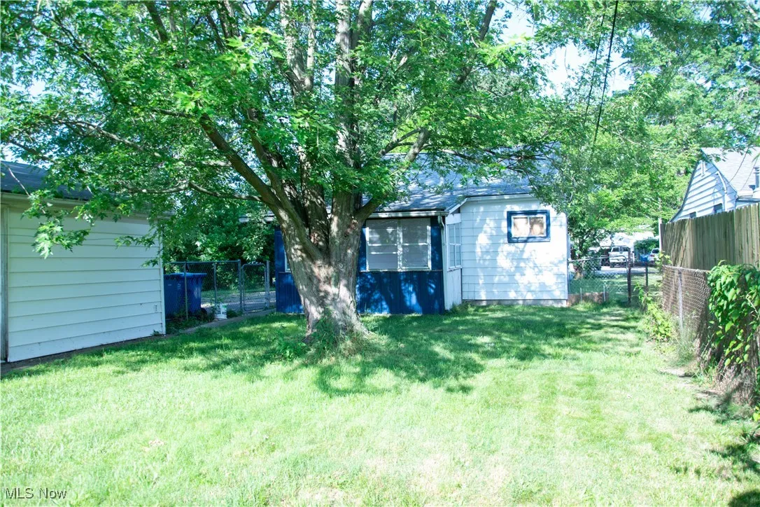 View of fenced backyard