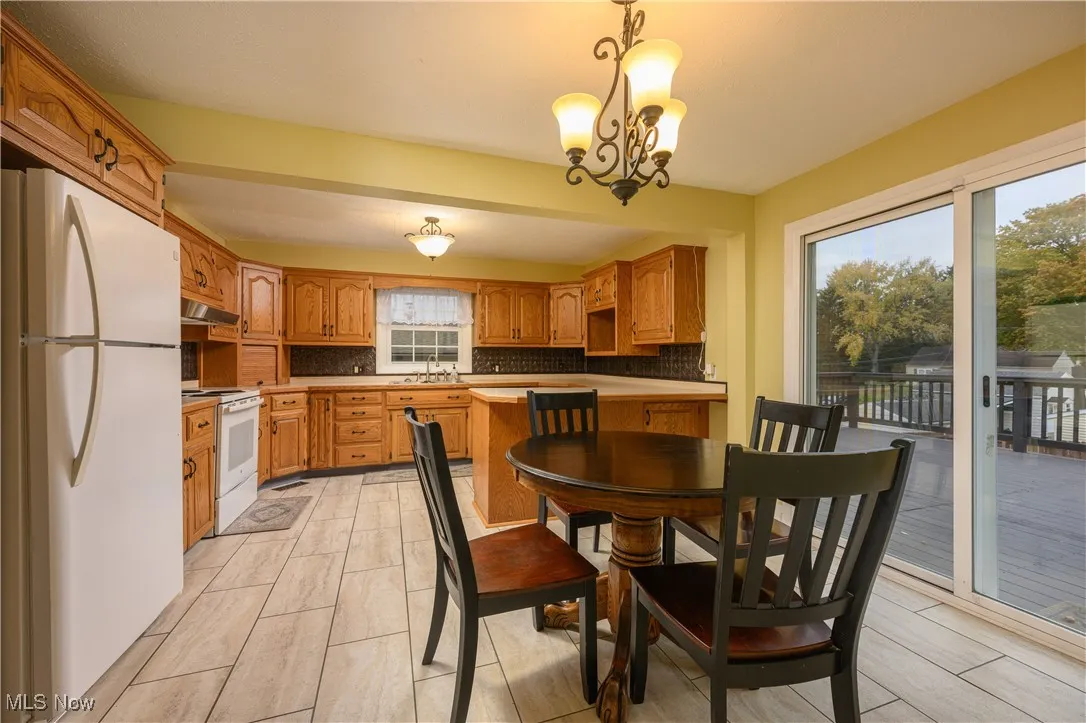 Dining space with a chandelier