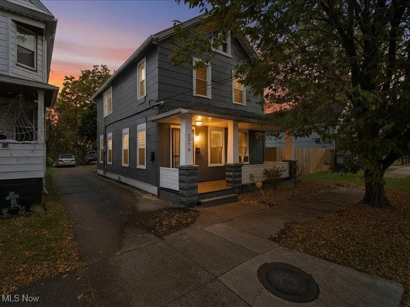 Traditional style home with a porch