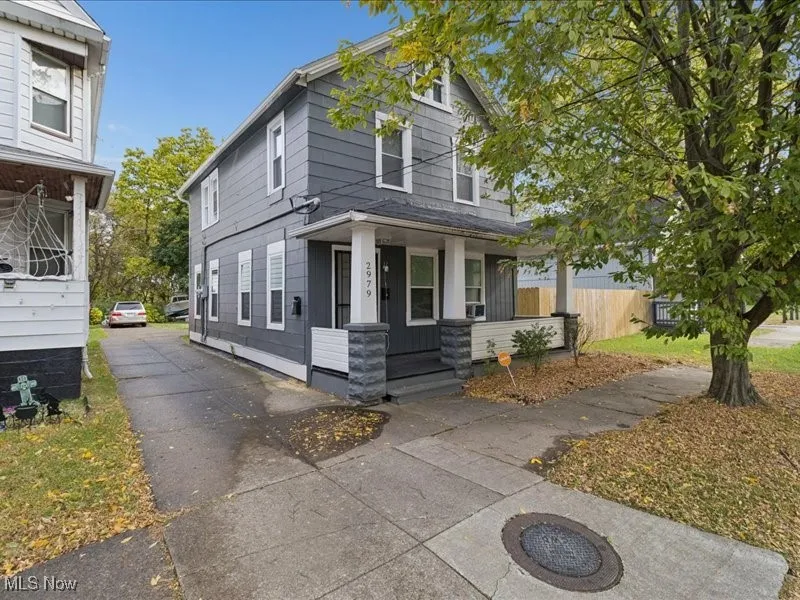 Traditional style home featuring a porch