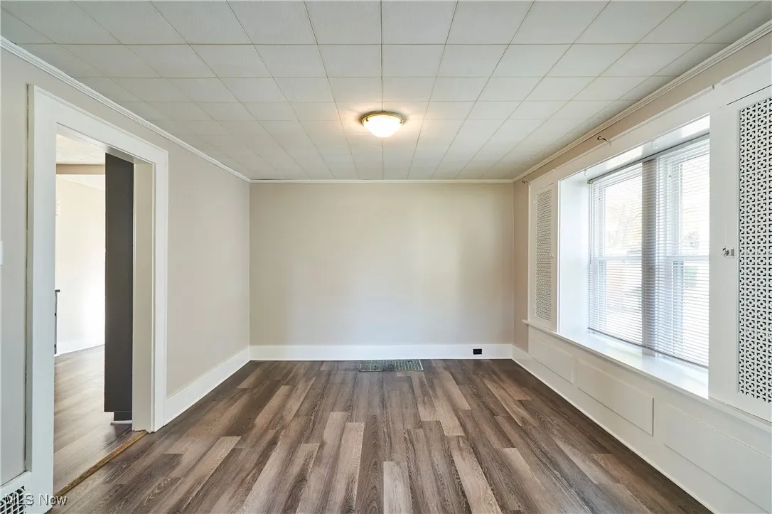 Formal Dining with LVT flooring, and newer LVt flooring and paint