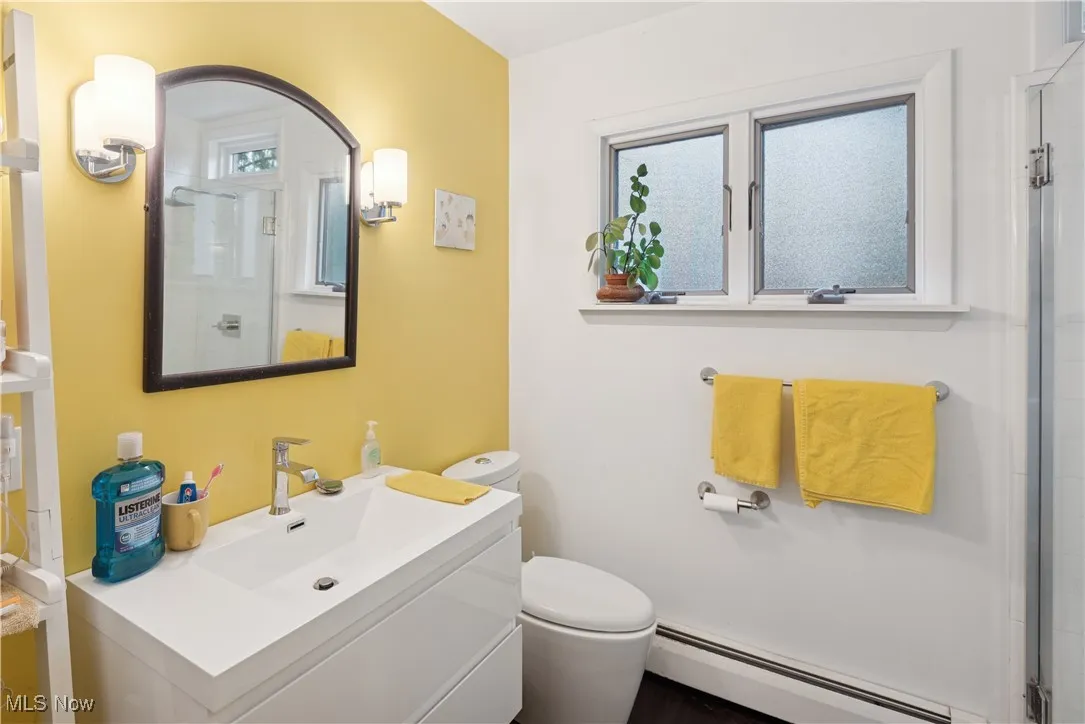 Fully updated bath on the main level shared by the three bedrooms