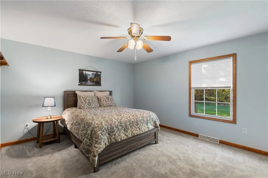 Primary suite includes full bathroom and walk in closet