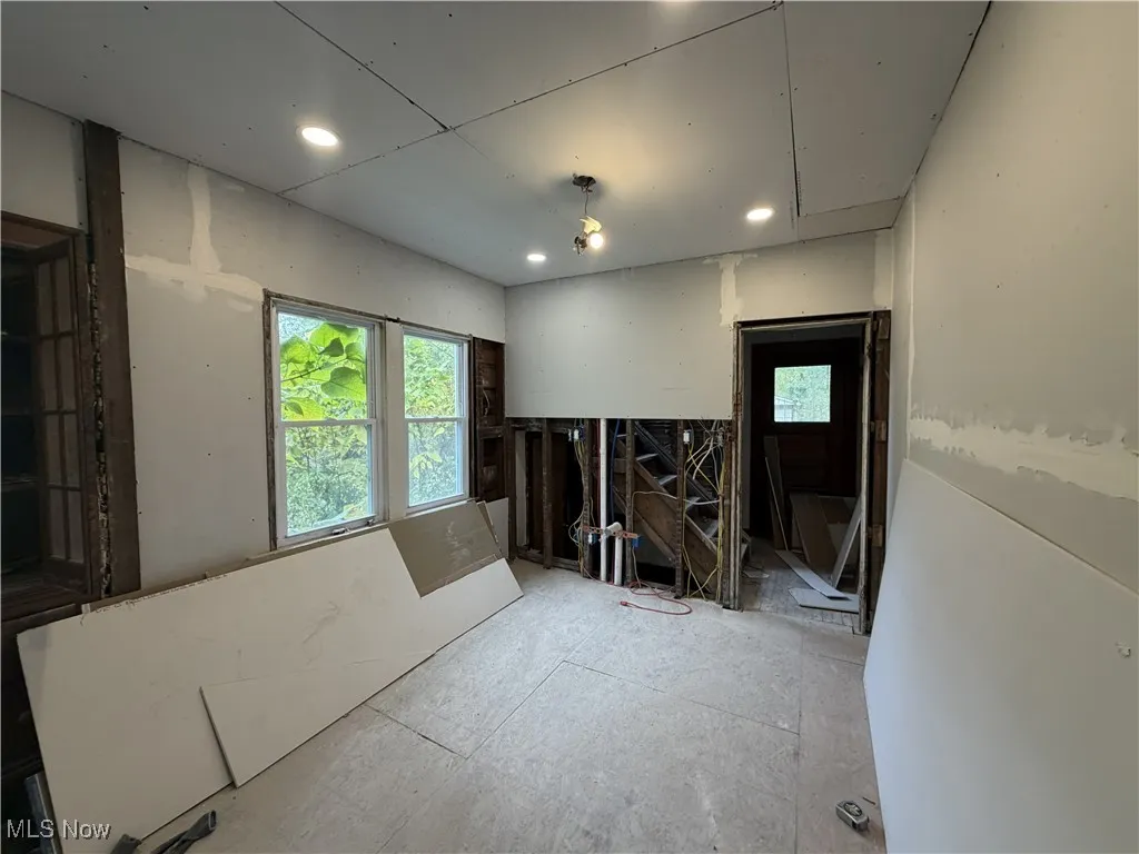 Unfurnished room with recessed lighting