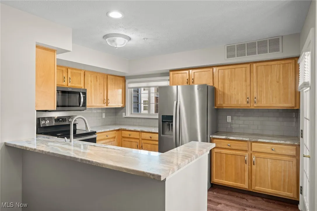 Granite countertops and stainless steel appliances