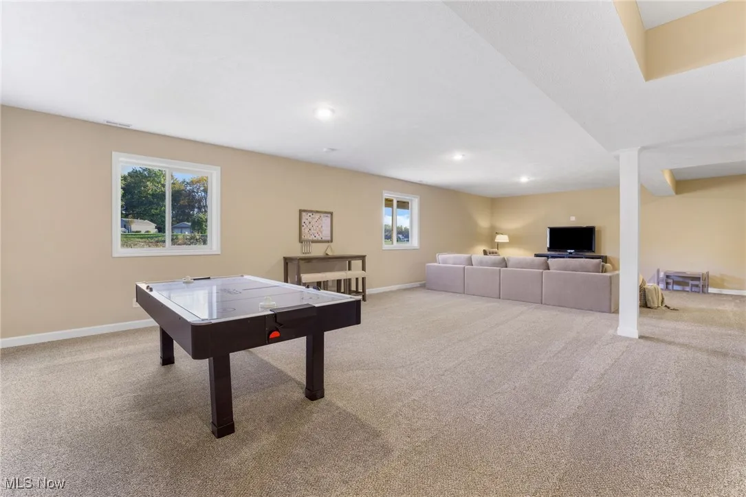 Game room with light carpet