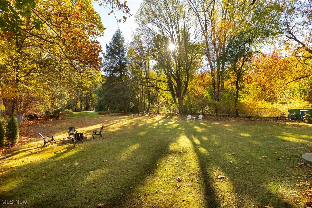 View of yard with a fire pit