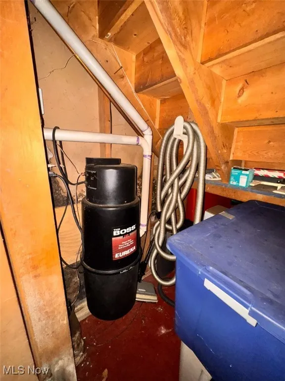 Utility room with a central vacuum unit