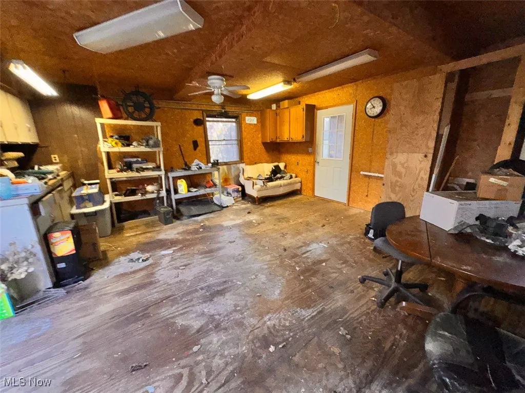Miscellaneous room featuring a ceiling fan