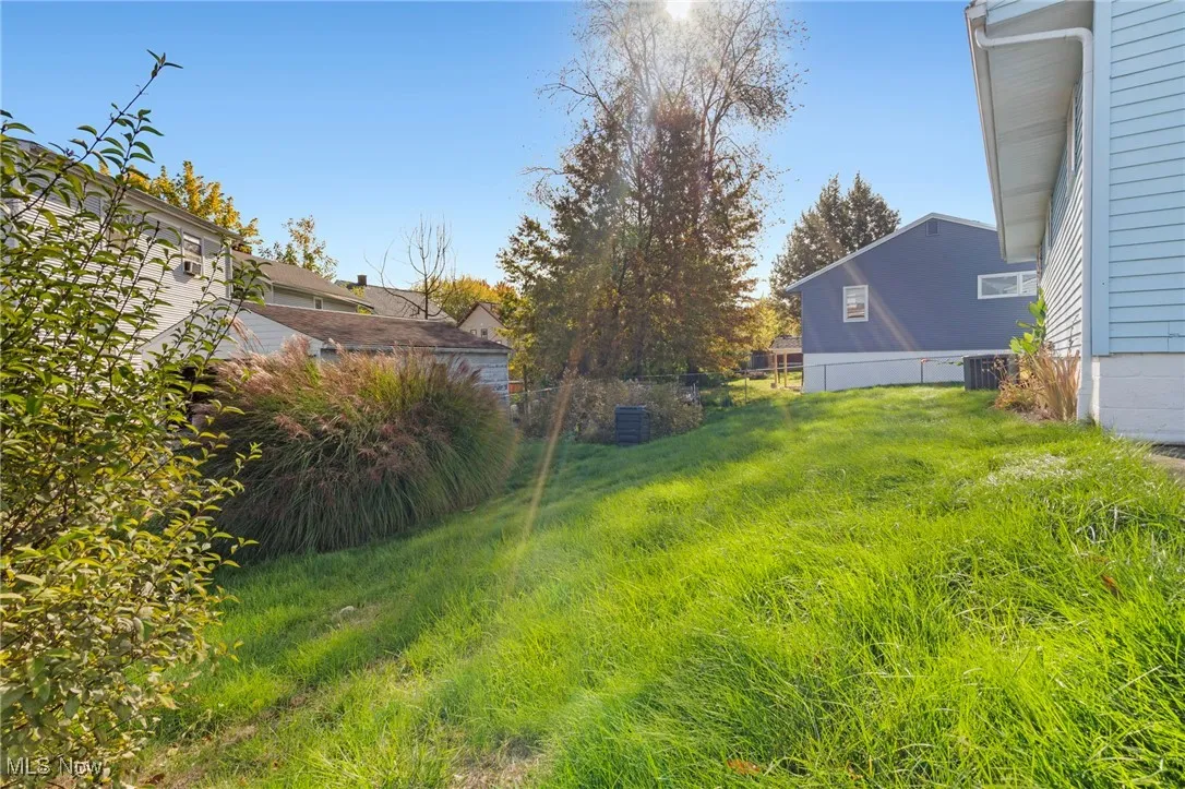 View of fenced in backyard