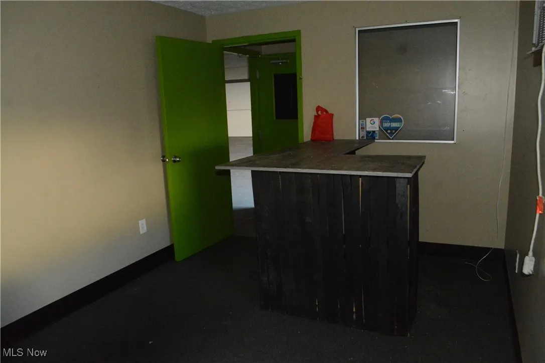 Bar featuring baseboards