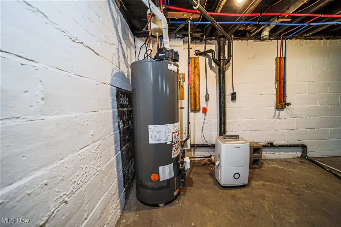 Utility room with gas water heater