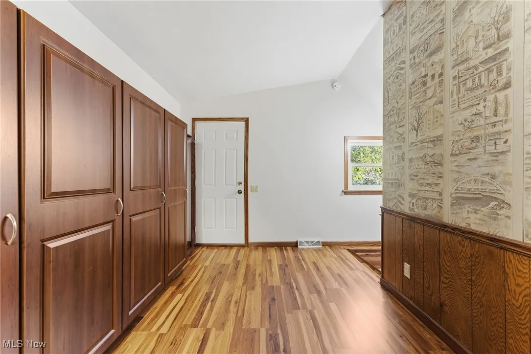 Mud room off the laundry room and with access to the backyard