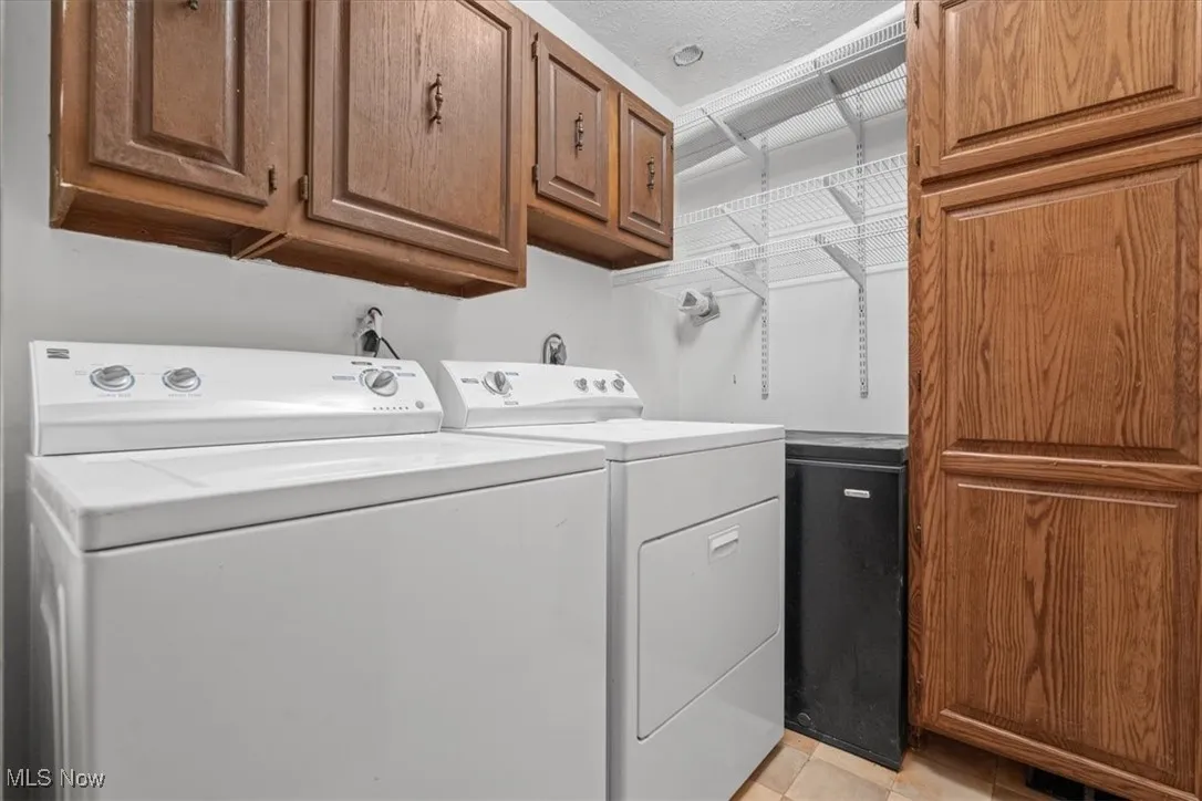 Laundry room on the main level is located just off the primary bedroom