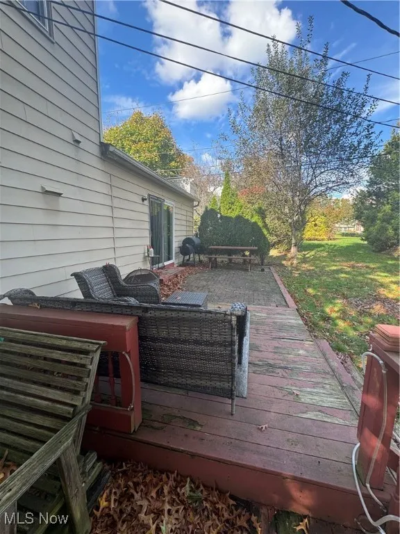 Deck featuring a yard