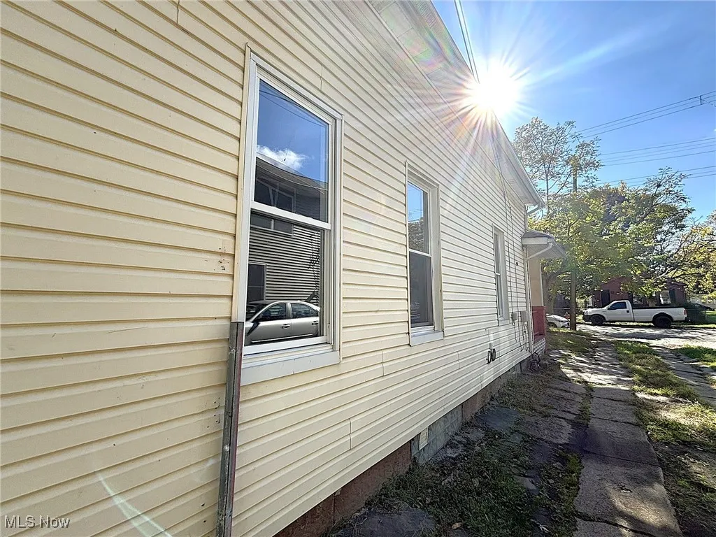 View of side of property featuring crawl space