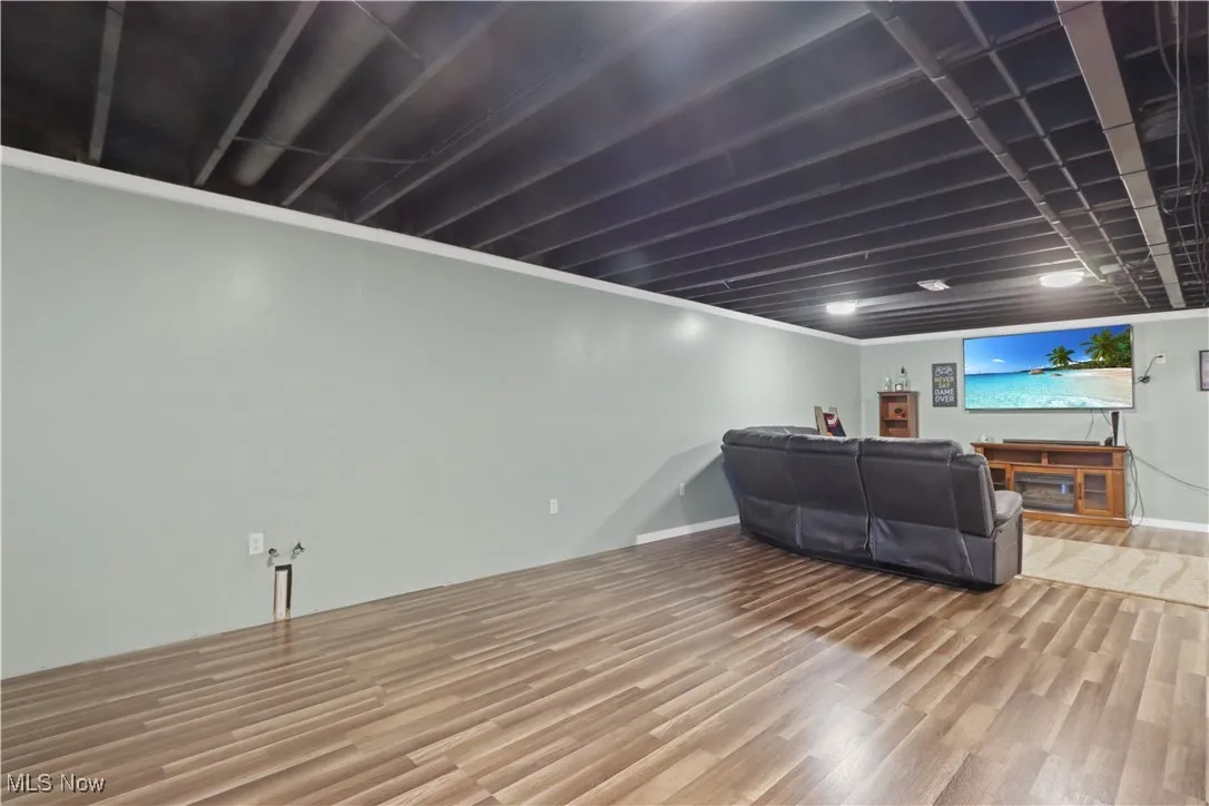 Living area with wood finished floors
