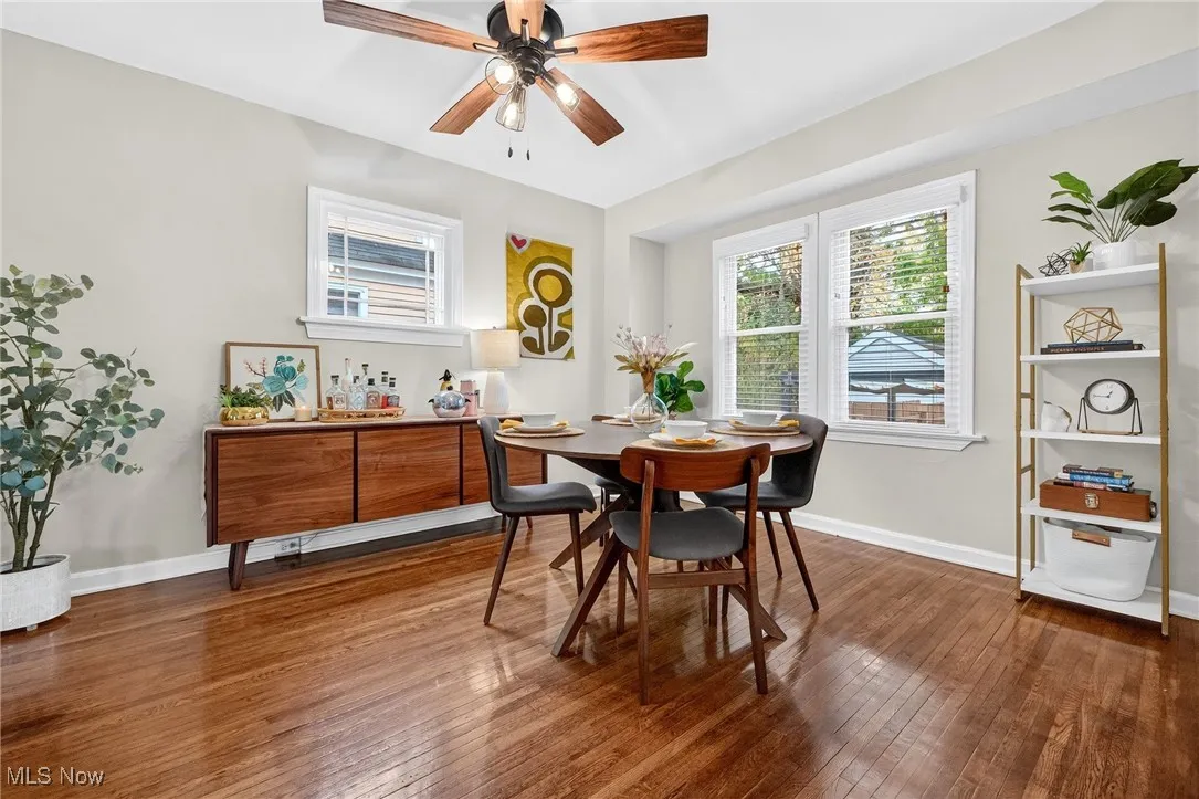 Dining room featuring hardwood / wood-style floors and ceiling fan