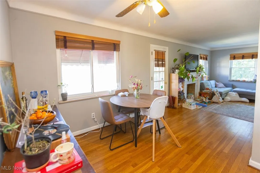 Up unit Dining area featuring light wood-type flooring and ceiling fan