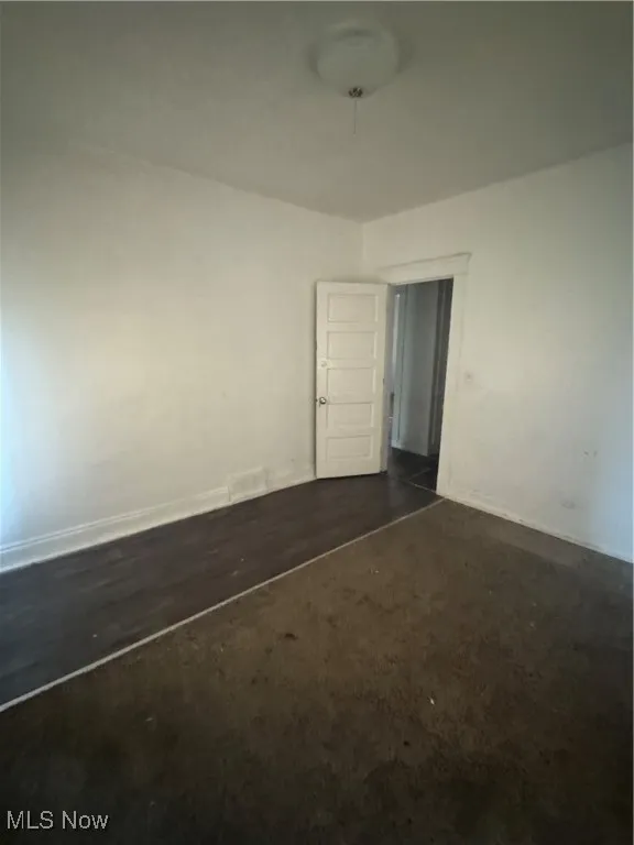Empty room with baseboards