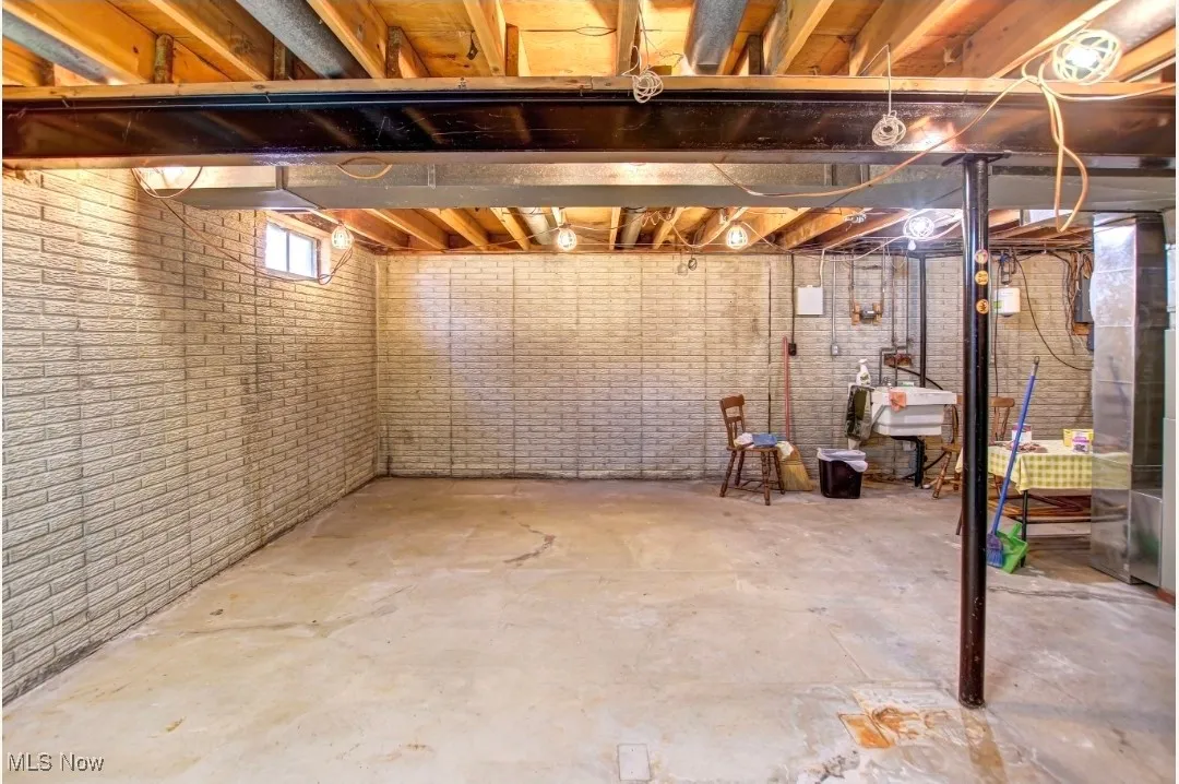 Below grade area with a laundry tub