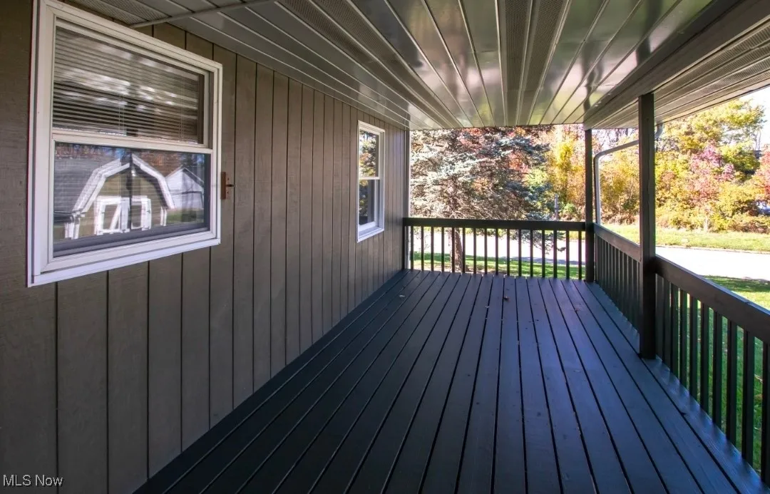 View of wooden terrace, backyard deck off family room