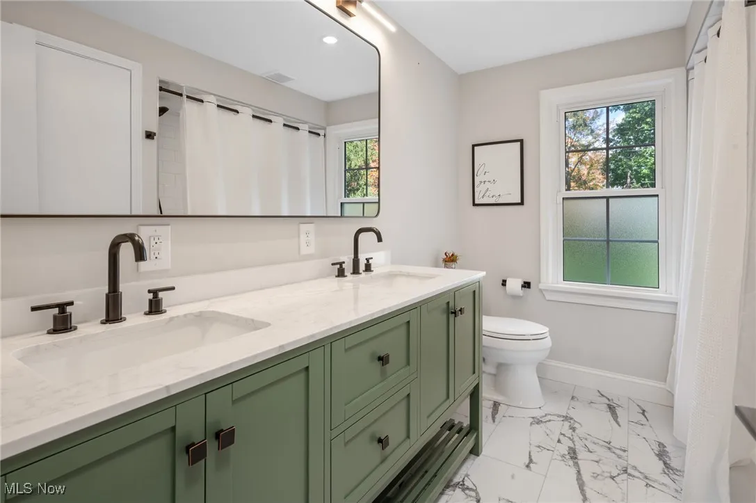 This upstairs guest bath was remodeled in the summer of 2025, with a 70