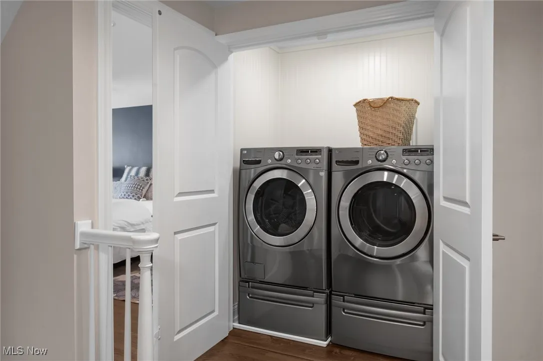 Second floor laundry offers convenience while the doors installed in 2023 allow for an elegant hallway.