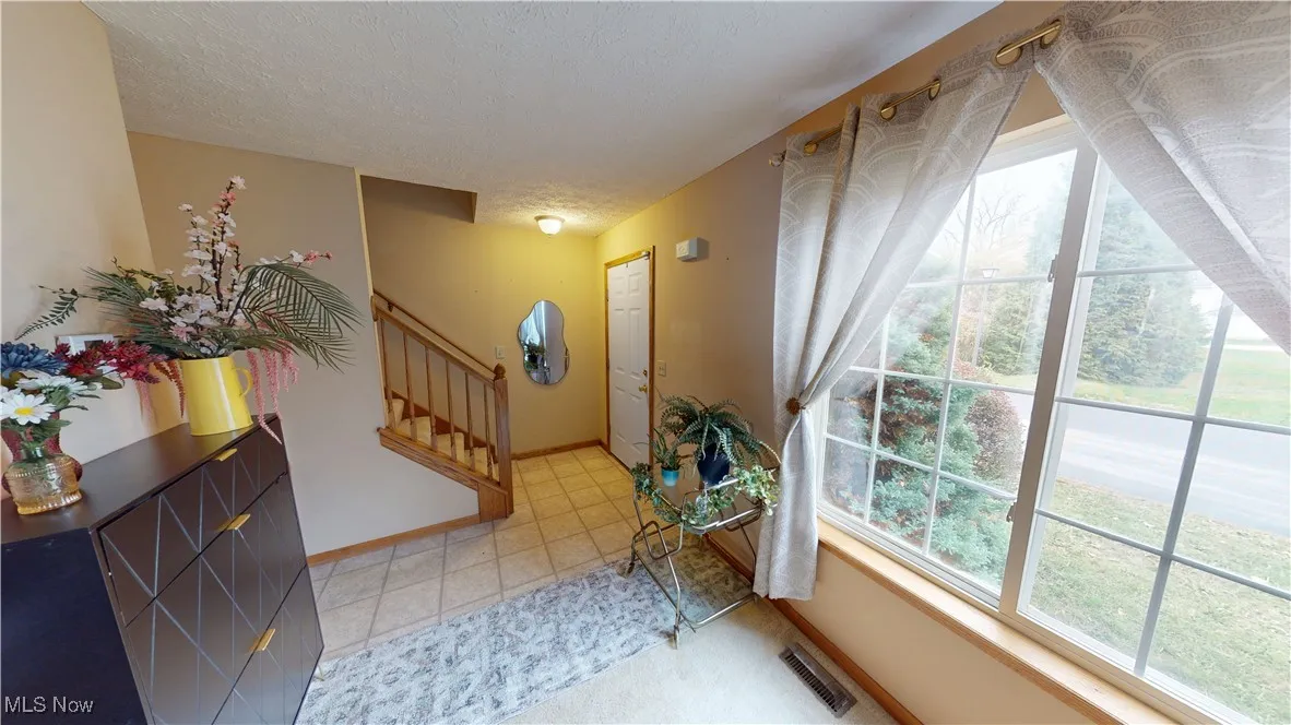 1090 Bennington Court, Lakemore, Ohio 44312,MLS Now Listing ID