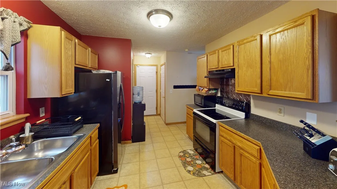 1090 Bennington Court, Lakemore, Ohio 44312,MLS Now Listing ID