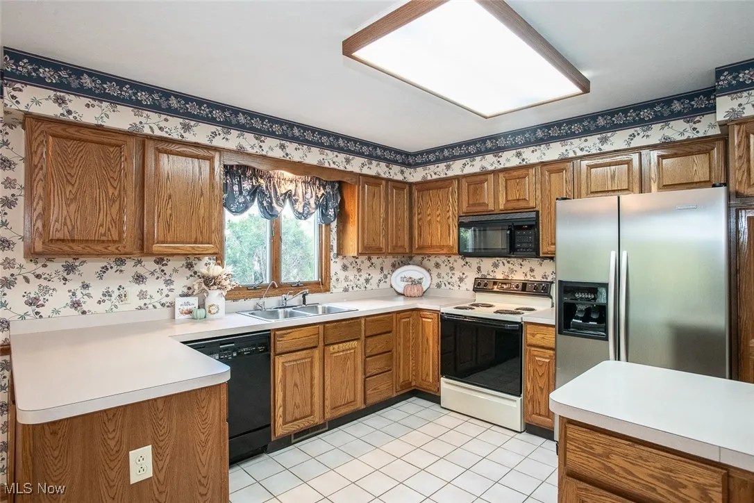 Lots of storage space, movable island all the appliance stay. If the décor is not your style, we have a quote available for you to have a professional painter remove wallpaper and repaint in your color or style.