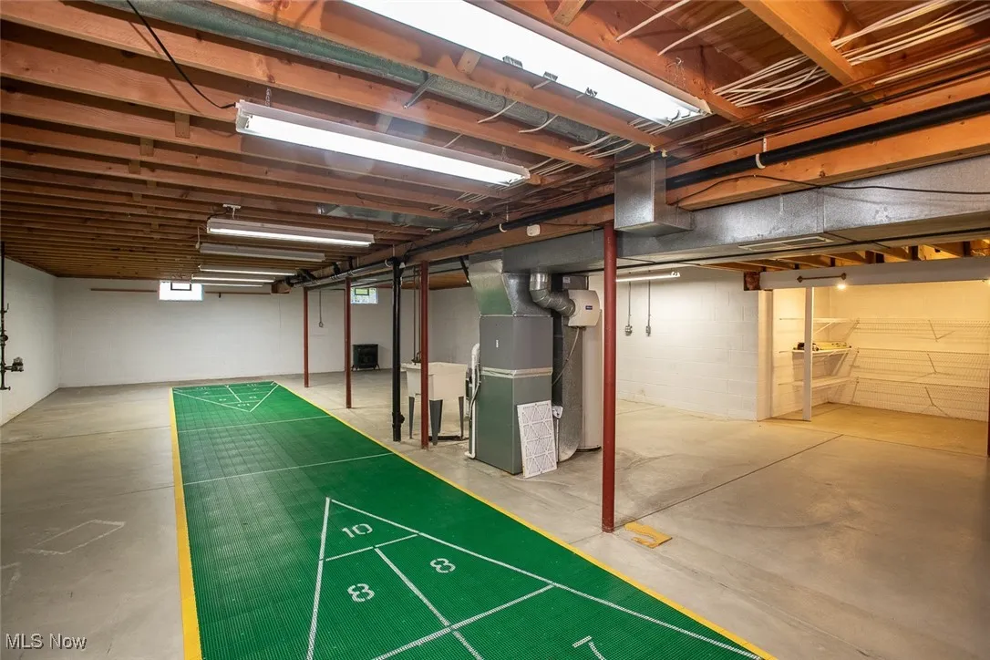 The shuffleboard can stay! Make some new wonderful memories in this home.