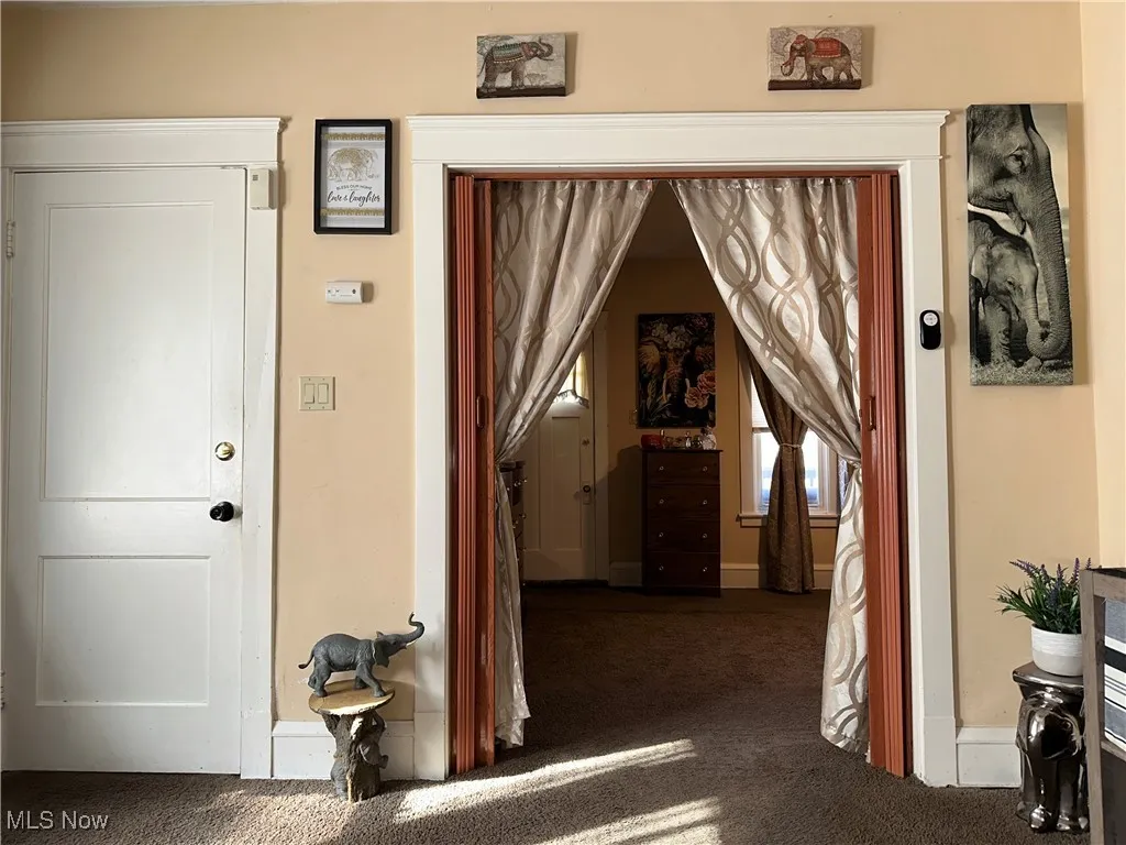 Hall with carpet flooring