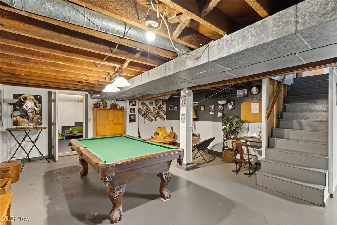 Recreation room featuring billiards and finished concrete floors