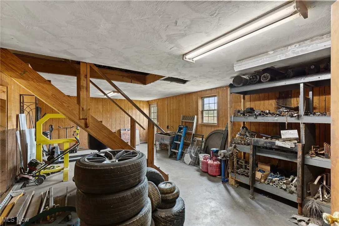 Below grade area with wooden walls