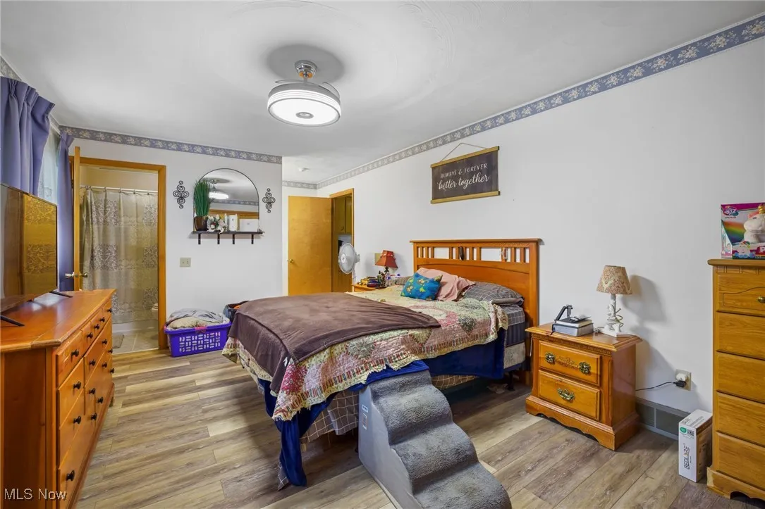 Primary bedroom with LVT floors