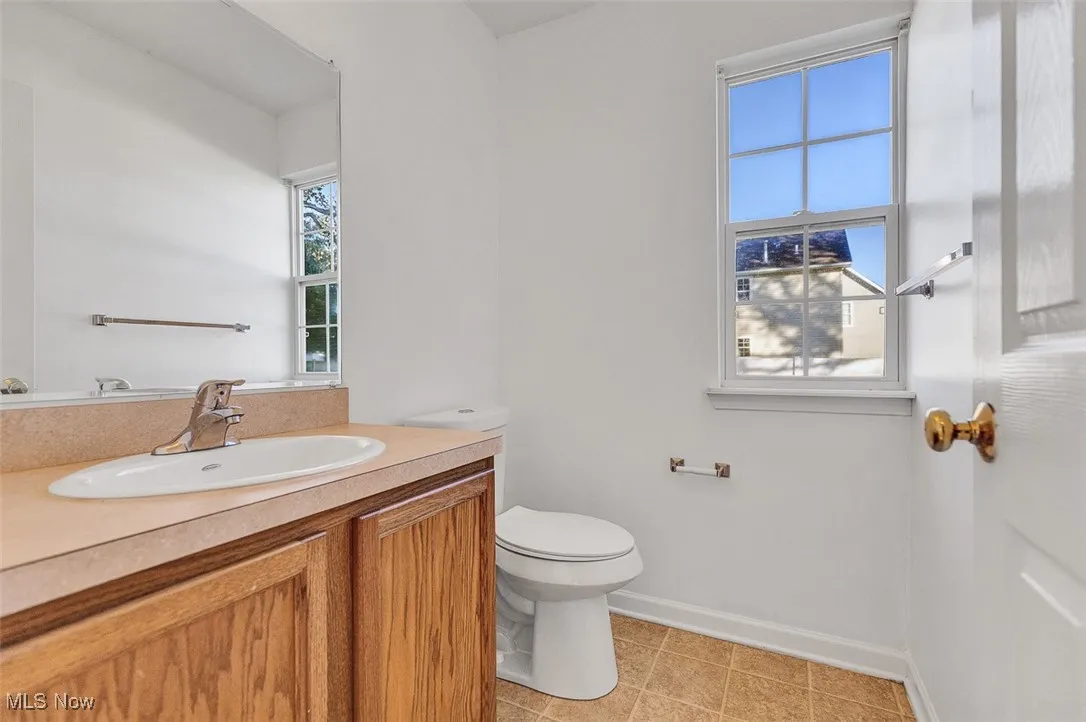 Half bath (main level) with healthy amount of natural light