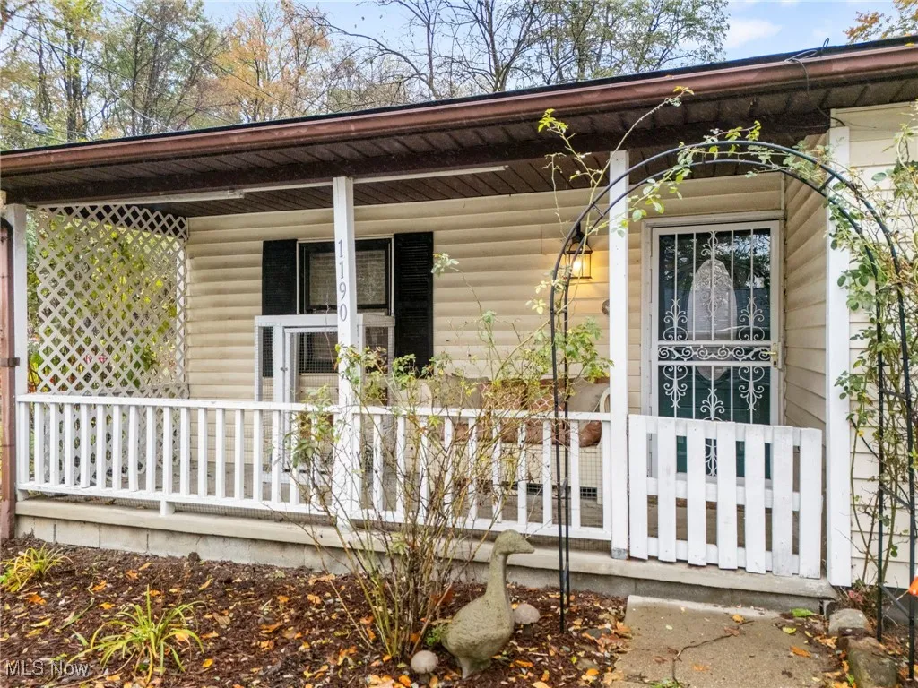 Entrance to property with covered porch