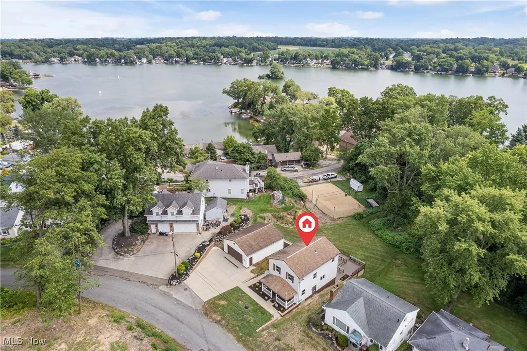 Aerial view of residential area with a large body of water