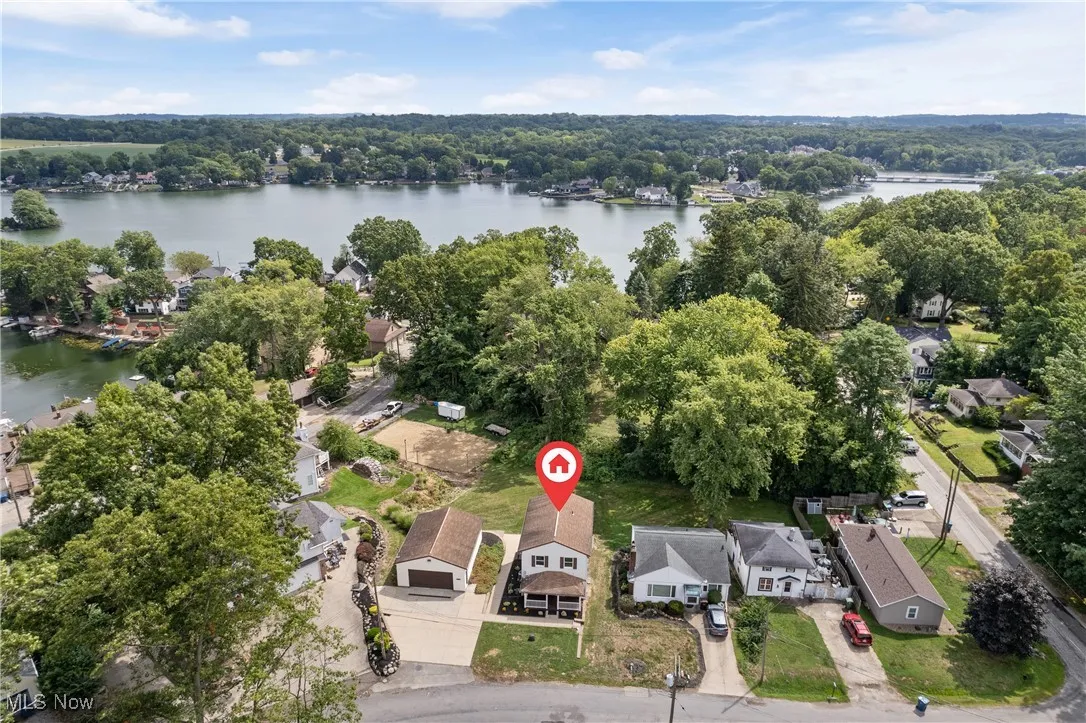 Aerial view of residential area with a nearby body of water