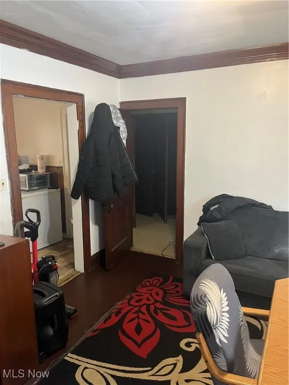 Living room with ornamental molding