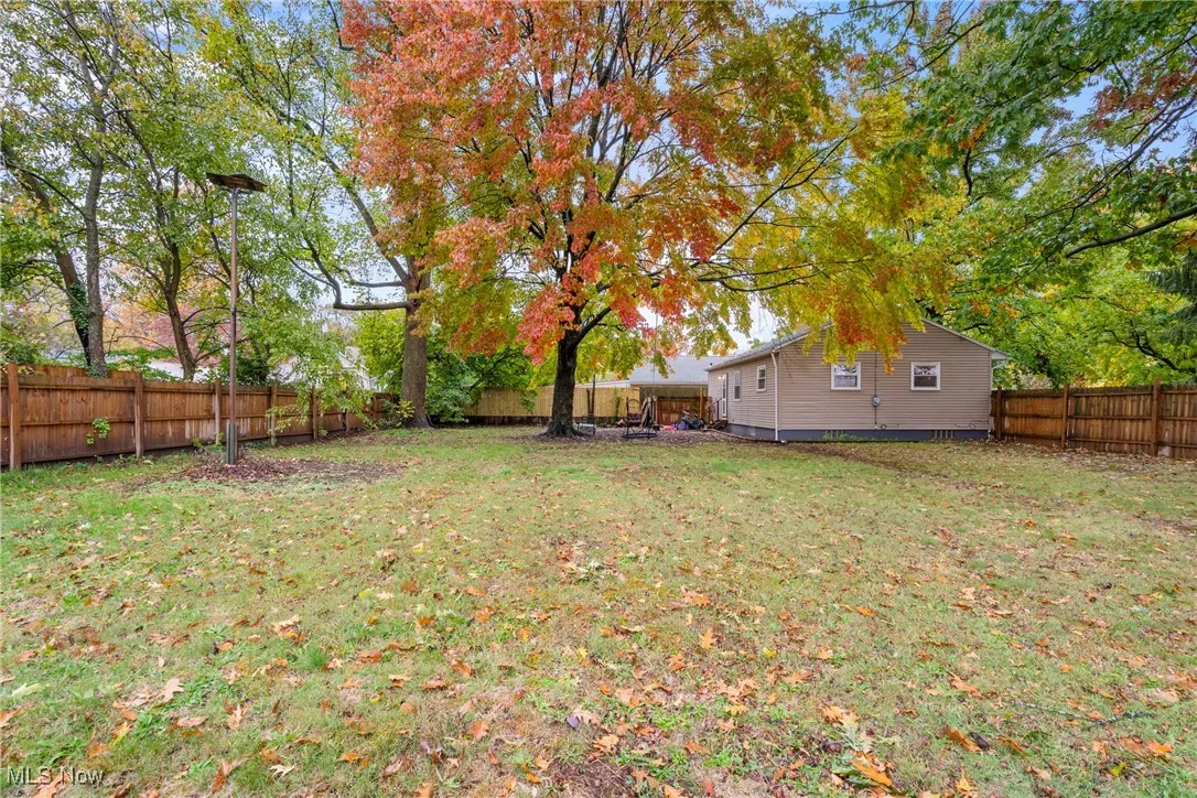 View of fenced backyard